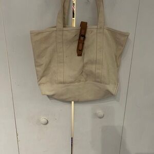 LL Bean Large  Cream and Tan  Tote Bag needs cleaning.